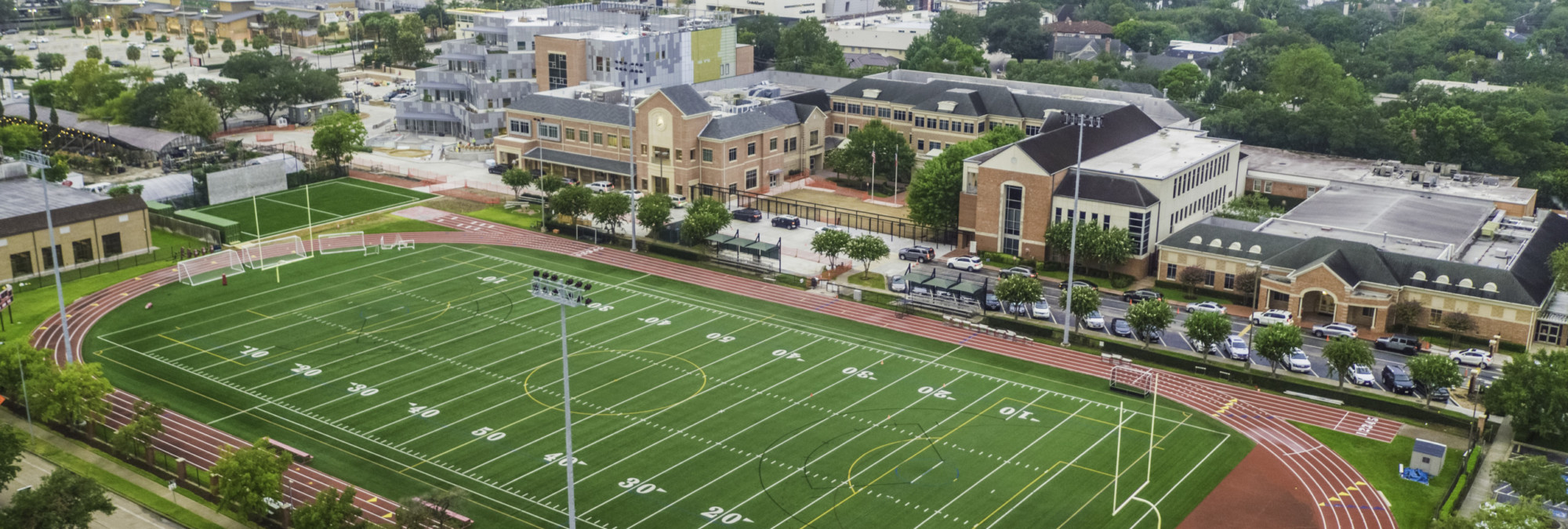 An aerial view of a football field at River Oaks Baptist School